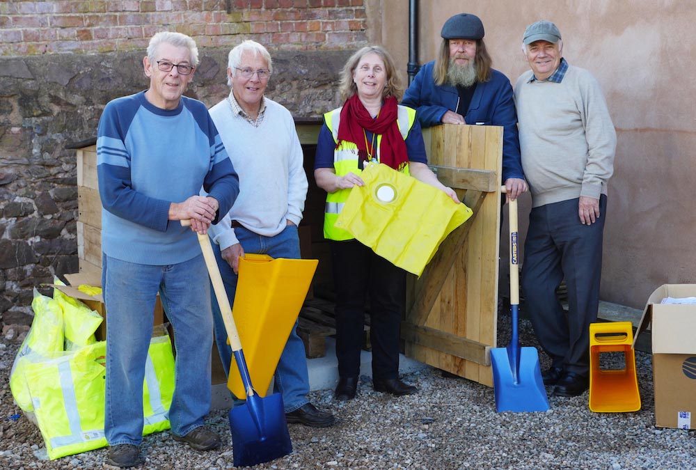 Dunster Flood Group members with Nicola Dawson of the Community Resilience in Somerset Partnership at Dunster's new community equipment store